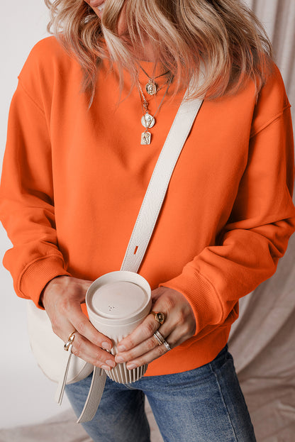 Einfarbiges Frottee-Sweatshirt mit überschnittener Schulter und Fleecefutter in Rotorange