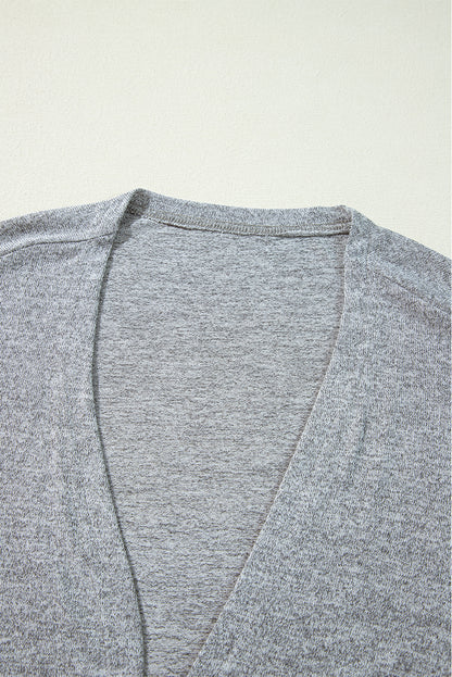 Leichte Strickjacke mit hoher Taille und offener Vorderseite in Volltonfarbe