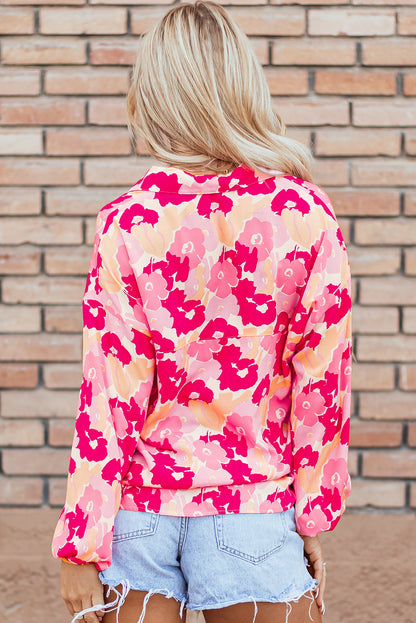 Rosafarbenes Hemd mit Puffärmeln und Blumenmuster