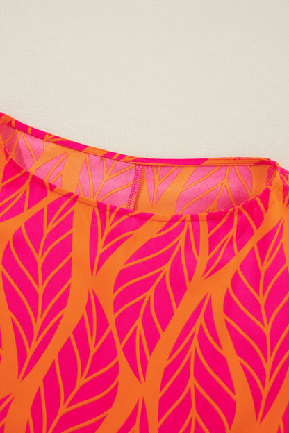 Rose – Bluse mit gesmokten Puffärmeln und tropischem Blattmuster