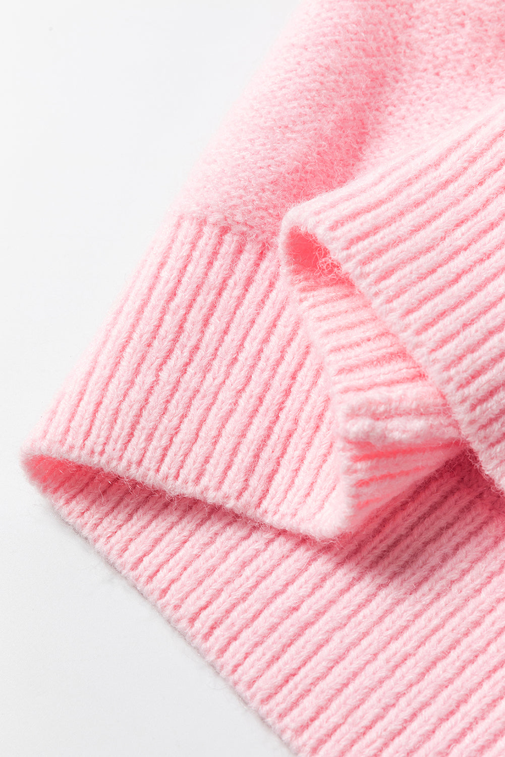 Rosa Strickpullover mit Blumenmuster und geripptem Rand