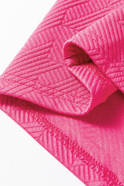 Rosarotes Set aus strukturiertem Oberteil und Hose mit Puffärmeln