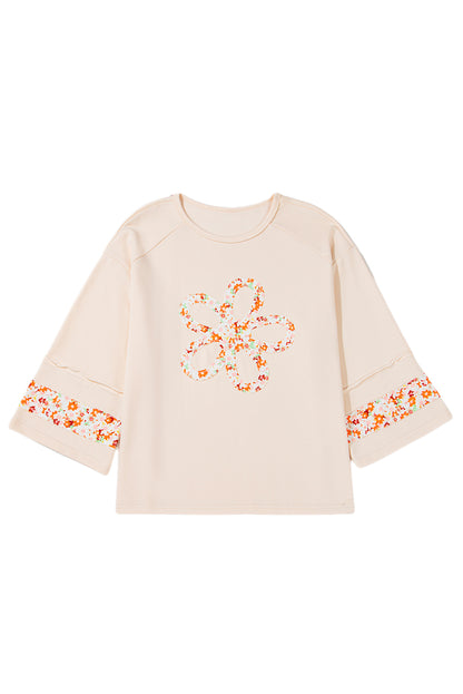 Beiges Plus Size Top mit Rundhalsausschnitt und Blumenpatches