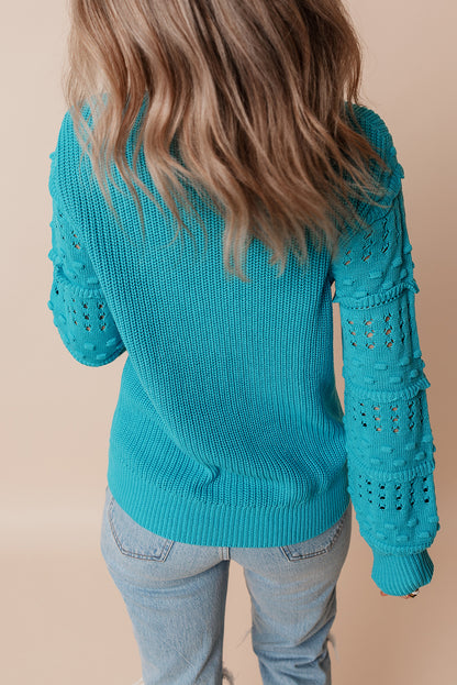 Türkisfarbener Pullover mit gerüschten Ösenärmeln