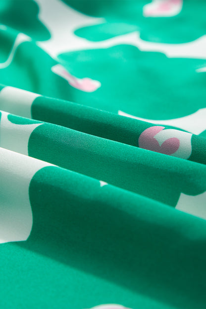 Grüne Bluse mit Blumenmuster, Puffärmeln und Rüschenausschnitt