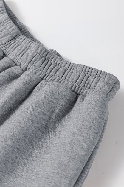 Graues Activewear-Set mit Kapuzenpullover und Jogginghose mit überschnittenen Schultern