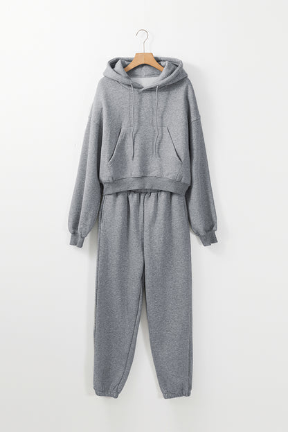 Graues Activewear-Set mit Kapuzenpullover und Jogginghose mit überschnittenen Schultern