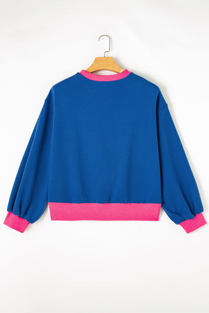 Blaues Sweatshirt mit Farbblock-Muster und Puffärmeln