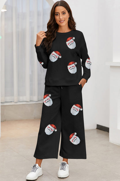 Schwarzes, strukturiertes Hosenset mit Weihnachtsmann-Print und Pailletten