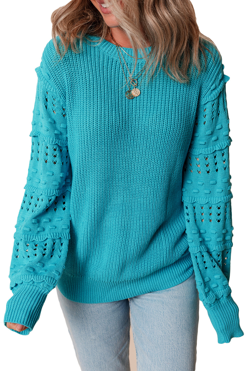 Türkisfarbener Pullover mit gerüschten Ösenärmeln