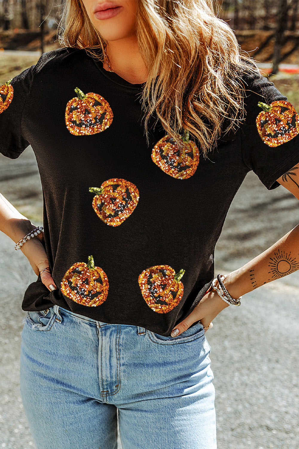 Schwarzes Pailletten-Kürbisgesicht-Halloween-T-Shirt