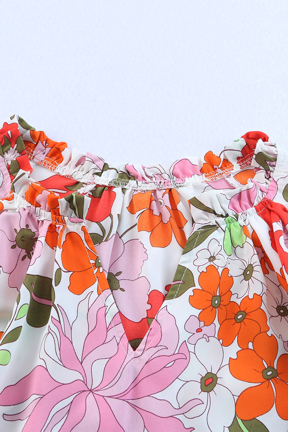 Orangefarbene Bluse mit Puffärmeln und Rüschenbesatz
