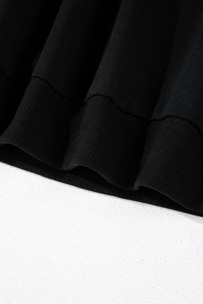 Schwarzes Sweatshirt mit Raglanärmeln und Farbblockdesign mit Leopardenmuster