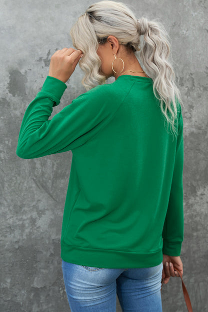 Grünes Sweatshirt mit Raglanärmeln und Glücksklee-Print von St. Patrick's Day