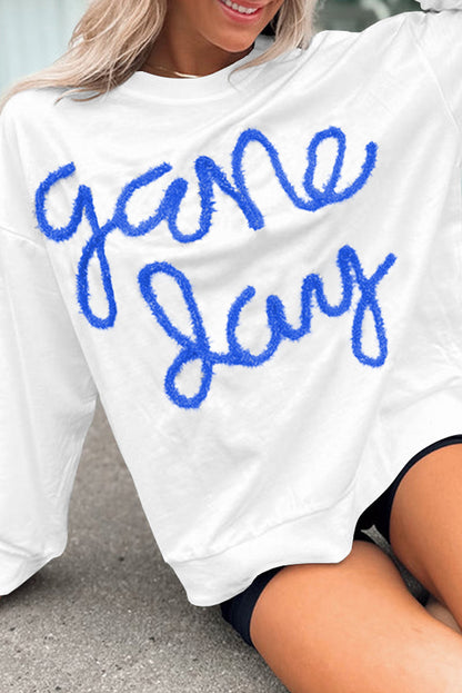 Weißes Lametta-Sweatshirt mit Game Day-Grafik und überschnittener Schulter
