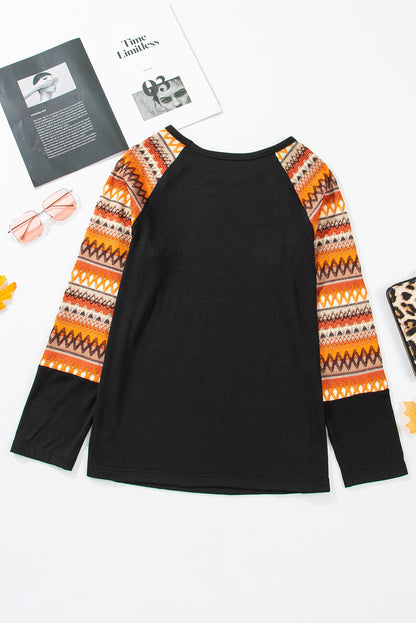 Oranges Raglan-Patchwork-Langarm-T-Shirt mit Geo-Print