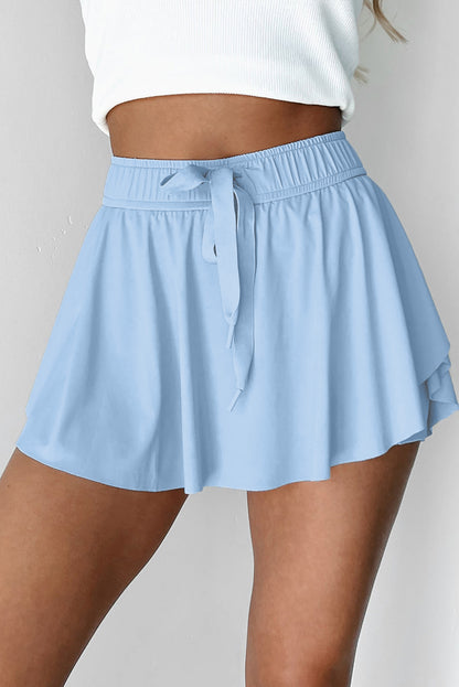 Himmelblauer Tennis-Skort mit Kordelzug und hoher Taille