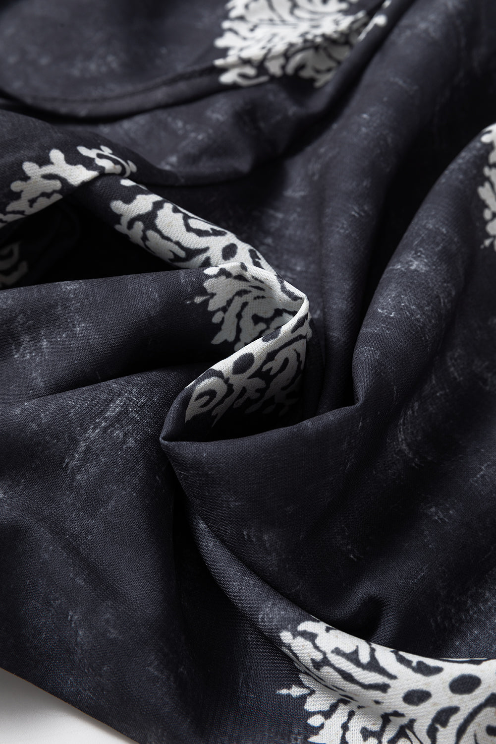 Schwarze Hose mit weitem Bein und Bohemien-Print