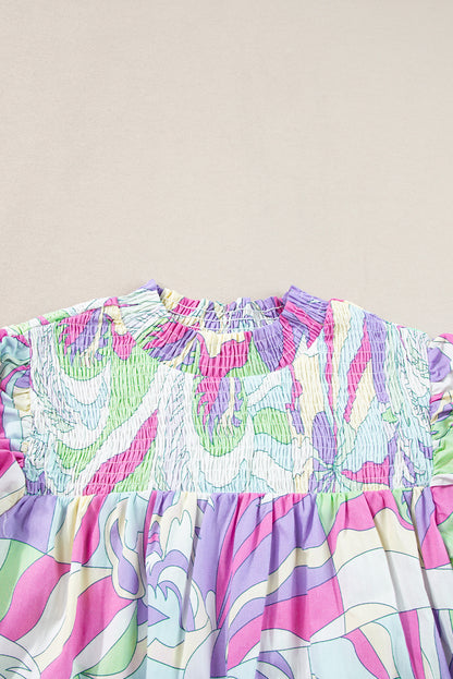 Grüne Bluse mit abstraktem Print und Puffärmeln