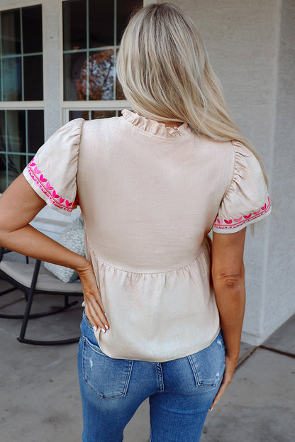 Beige Bluse mit V-Ausschnitt und Blumenstickerei, kurzärmlig