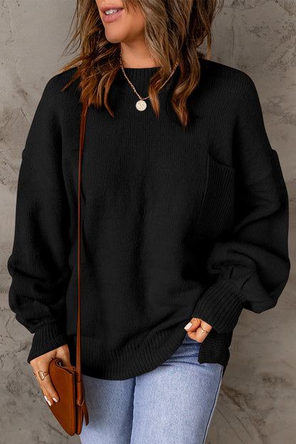 Schwarzer, einfarbiger Pullover mit Puffärmeln und Taschen
