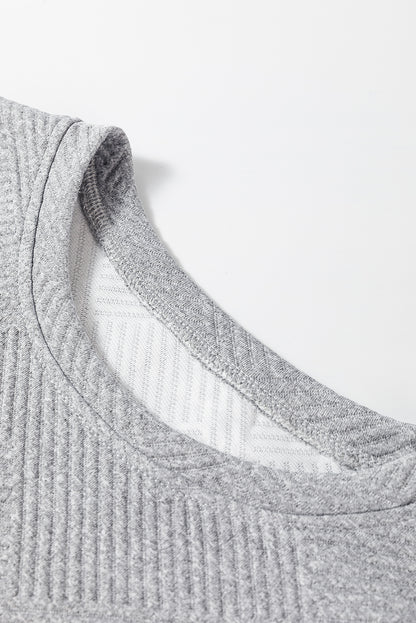 Graues, einfarbiges, strukturiertes Etuikleid mit langen Ärmeln