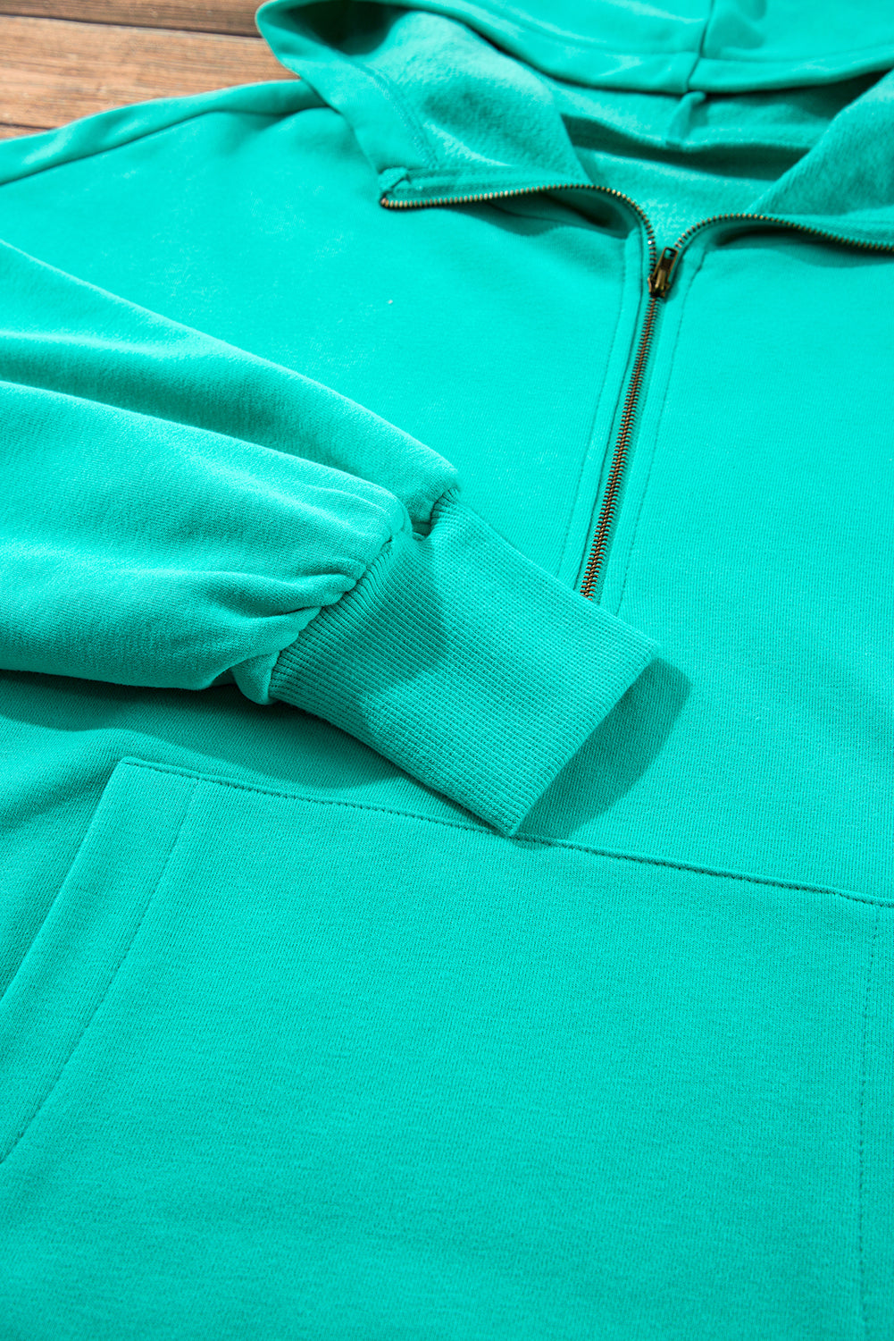 Aruba Blauer, lockerer Hoodie mit Fleecefutter und Kängurutaschen mit halbem Reißverschluss