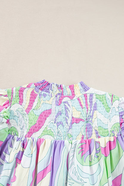 Grüne Bluse mit abstraktem Print und Puffärmeln