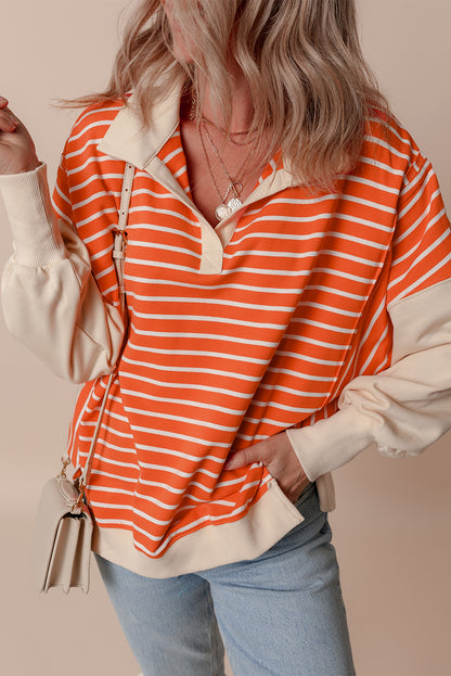 Orangefarbenes Sweatshirt mit Farbblockdesign und lockerer Passform, Kragen und überschnittenen Schultern