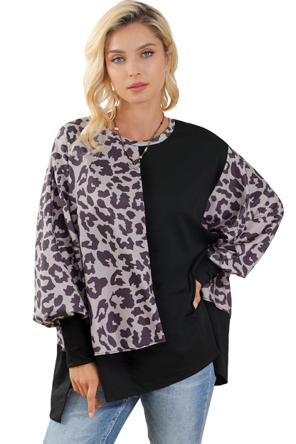 Schwarzes Sweatshirt mit Leoparden-Patchwork und Schlitzen im Bischofsärmel-Stil