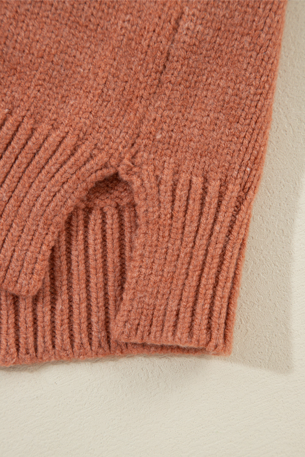 Kurzer Cardigan mit überschnittenen Schultern und offener Vorderseite in Hellbeige