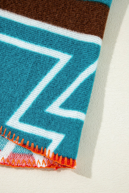 Himmelblaue Jacke mit Revers und Glockenärmeln im Azteken-Print