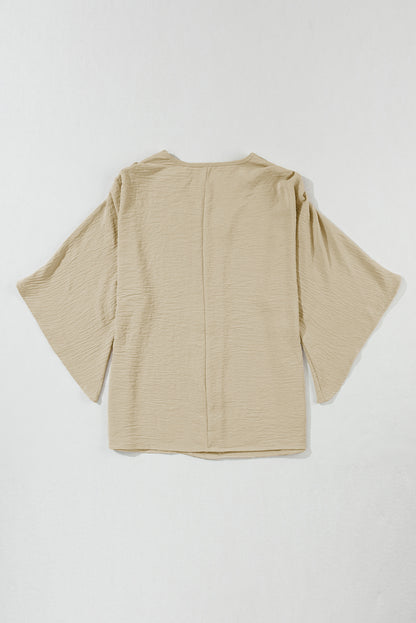 Parchment – Bluse mit V-Ausschnitt und weiten Ärmeln in Knitteroptik