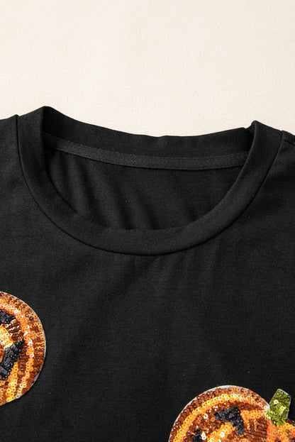 Schwarzes Pailletten-Kürbisgesicht-Halloween-T-Shirt