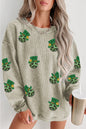 Grünes Sweatshirt mit Pailletten und St. Patrick's Day-Diskokugel-Patch