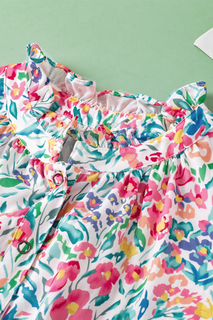 Rosa Bluse mit Blumenmuster, Knöpfen, Schlitz am Ausschnitt und Puffärmeln