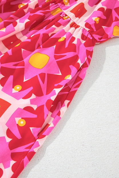 Erdbeerrosa gesmoktes Minikleid mit langen Ärmeln und geometrischem Print