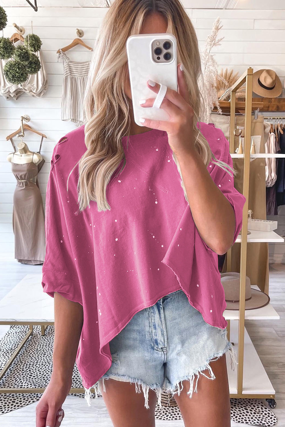 Rosa, gebleichtes Top mit asymmetrischem Saum im Used-Look und kurzen Ärmeln