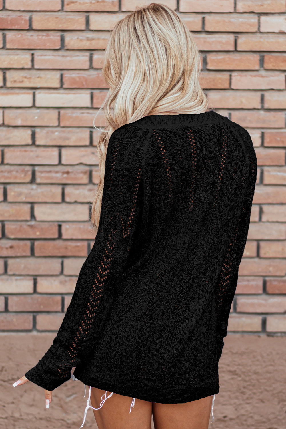 Schwarzer, einfarbiger Cardigan mit offenem Saum