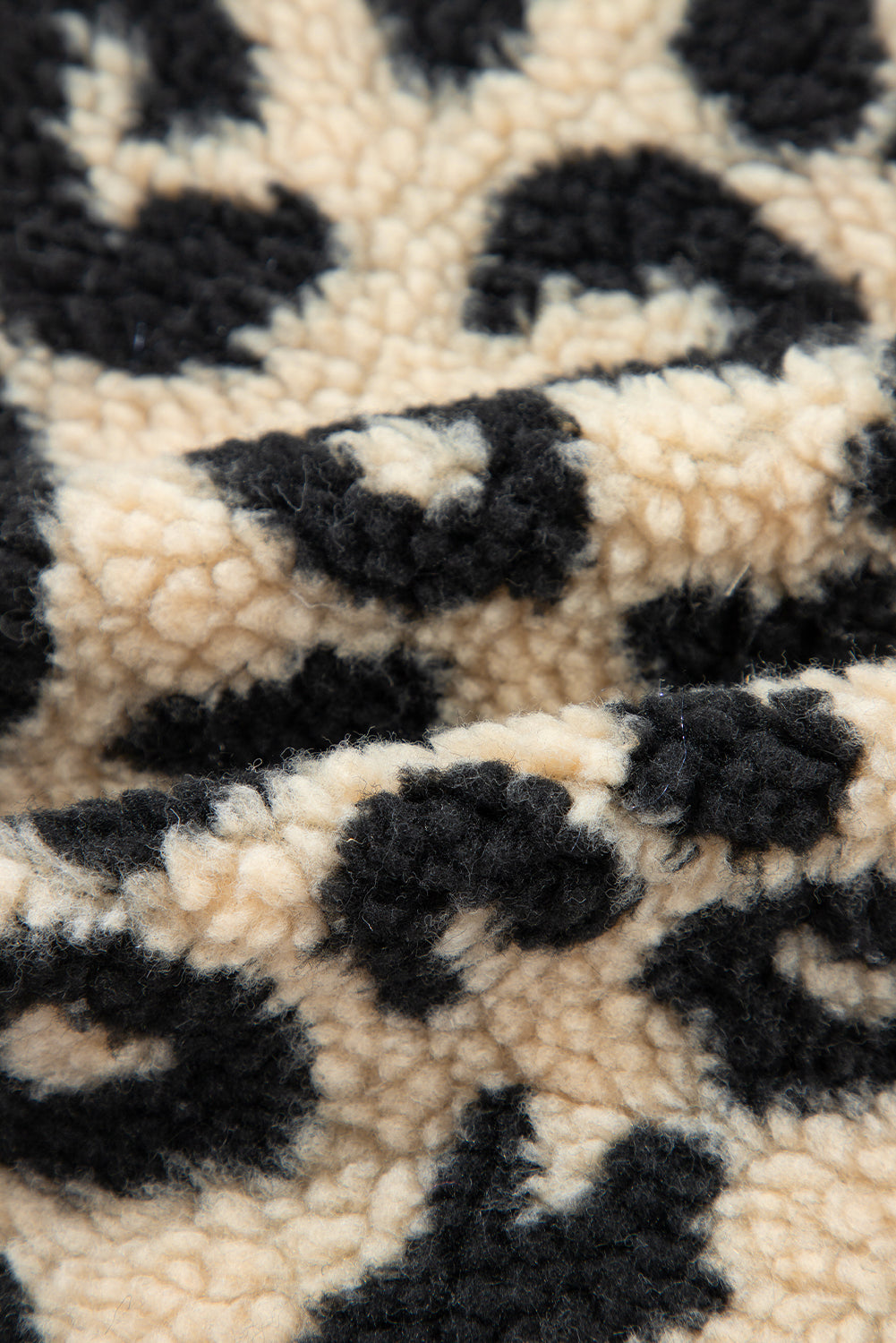 Schwarzer Sherpa-Westenmantel mit Leopardenmuster