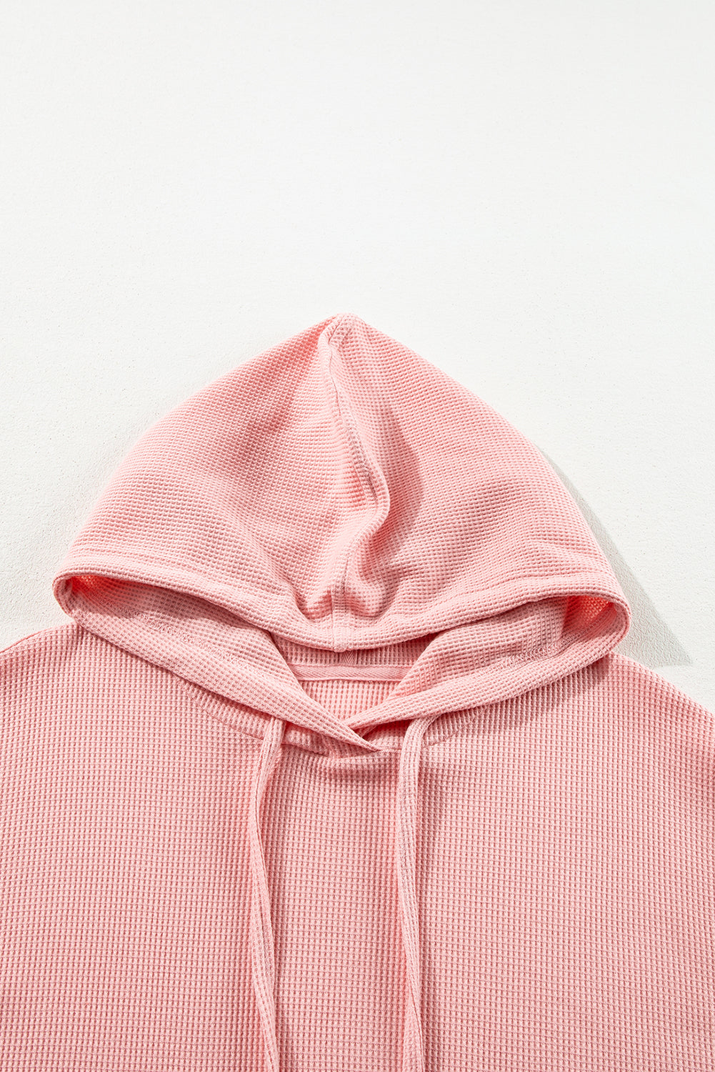 Hellrosa Oversize-Hoodie mit Waffelstrick und Fleecefutter, hoch und niedrig
