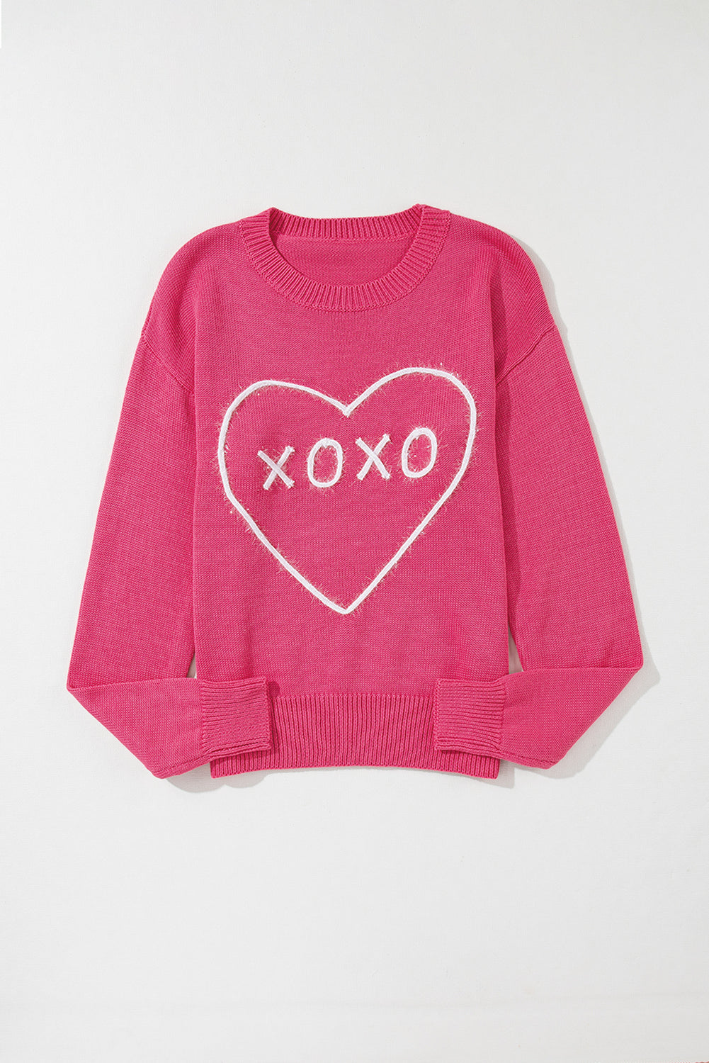 Rippstrickpullover mit überschnittener Schulterpartie und Rosenherz-XOXO-Muster