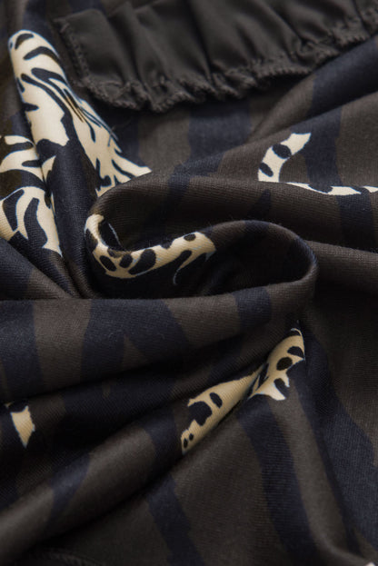 Schwarzes, stylisches Oberteil mit Rüschenärmeln und Animalprint