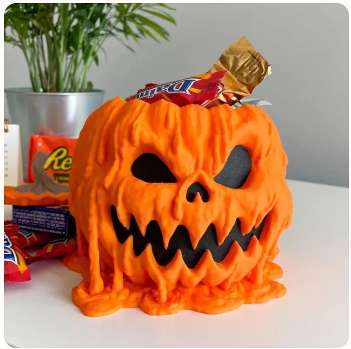Schmelzende Halloween-Kürbis-Süßigkeitenschale