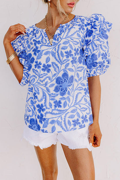 Dunkelblaue Bluse mit Blumenmuster und Rüschen und Puffärmeln