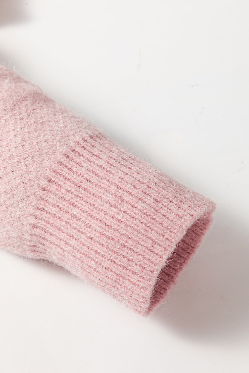 Rosa Pullover mit Blumenmuster und halblangem Reißverschluss sowie überschnittenen Schultern