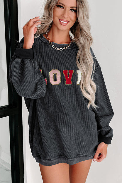 Schwarzes Sweatshirt mit Chenille-Stickerei und Grafik „LOVE“