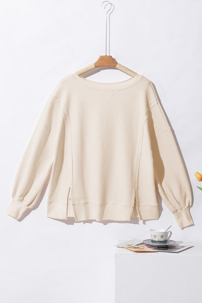 Weißes Oversize-Sweatshirt mit Waffelstrick und Bischofsärmeln