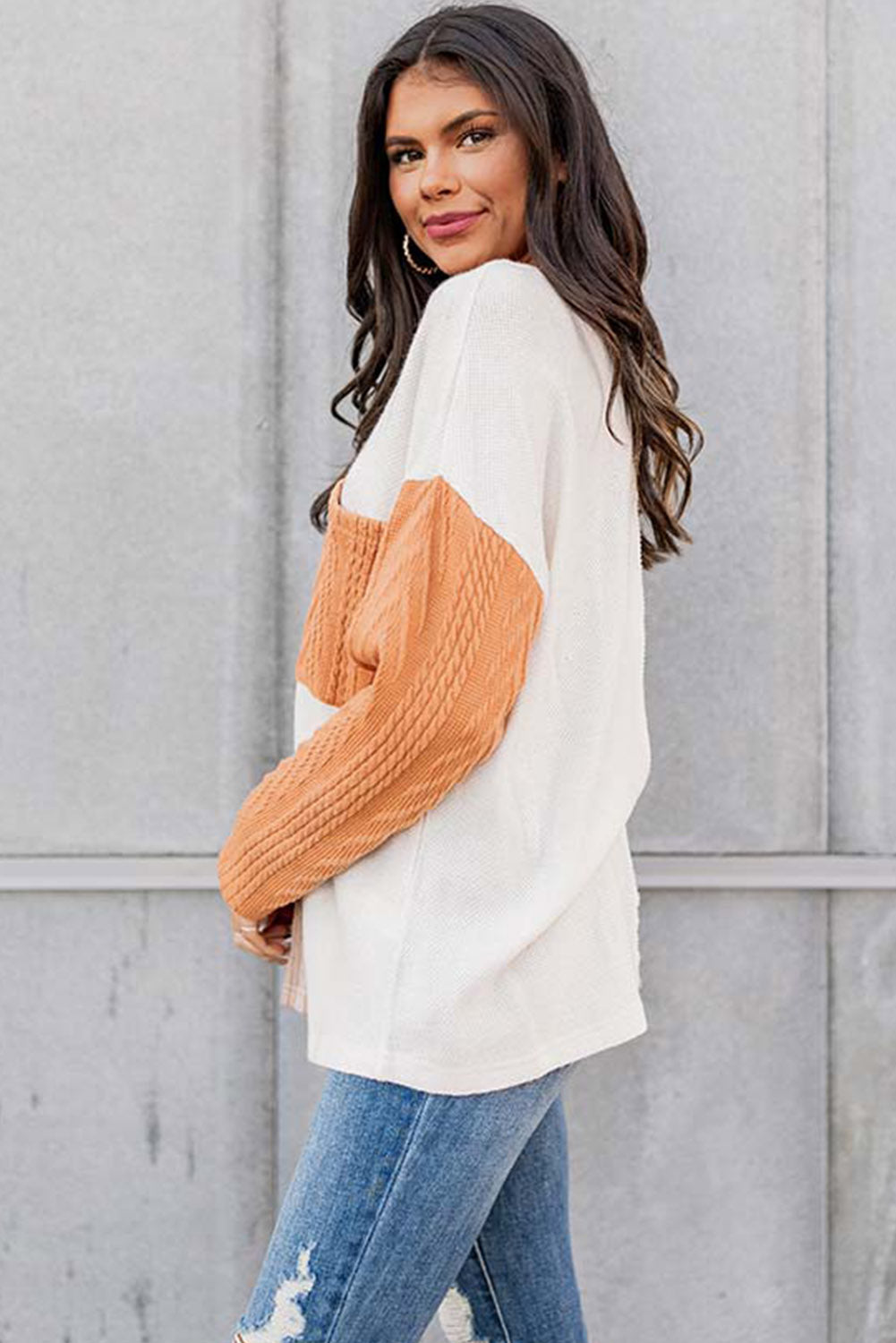Oranges, langärmliges, strukturiertes Strickoberteil mit Colorblock-Brusttasche