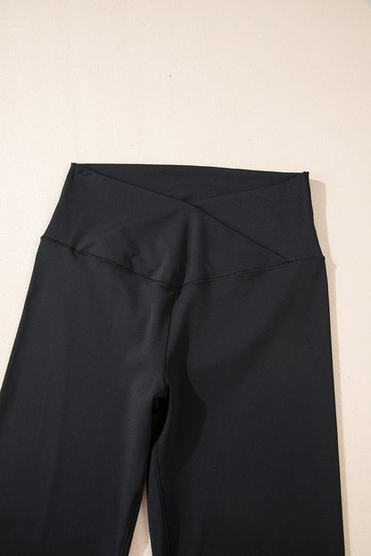 Schwarze, ausgestellte Leggings in V-Form mit hoher Taille